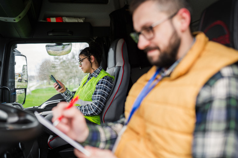 Authorized passenger riding with a professional truck driver